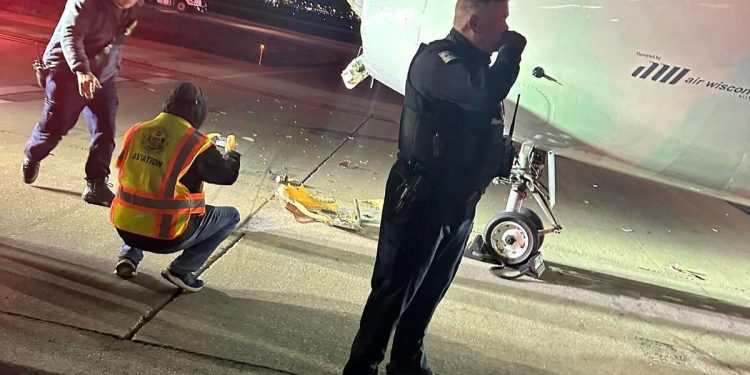 American Airlines uçağı, pistte servise çarptı